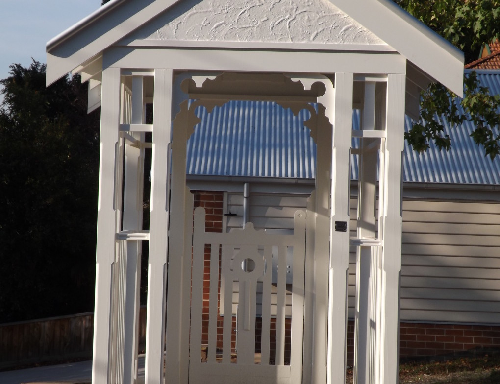 wooden_gate_house_corrugated_roof